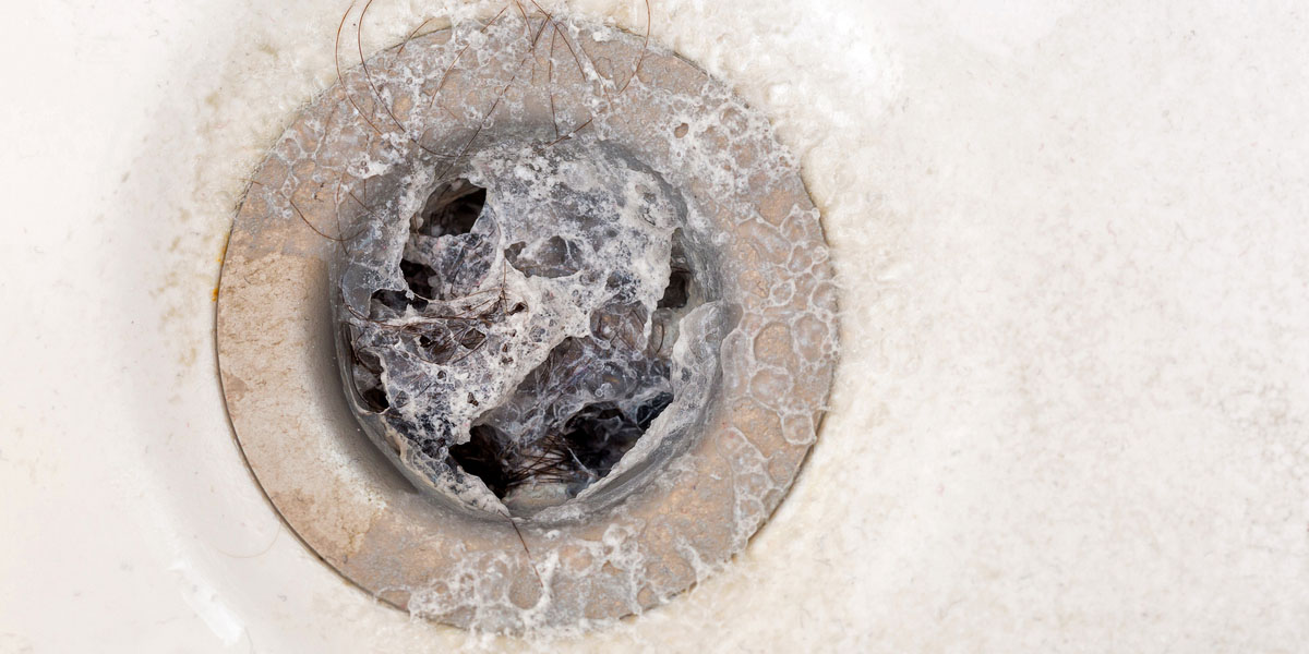 Is Your Shower Drain Clogged with Hair? Here's What to Do
