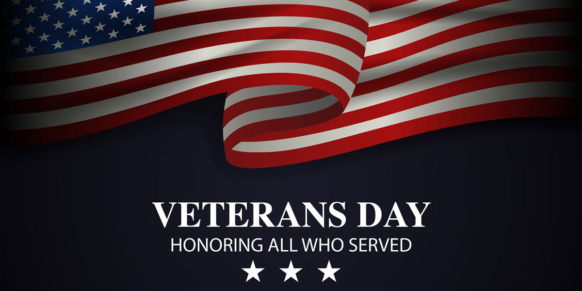 "Veterans Day Honoring All Who Served" flag image on black background